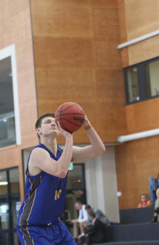 Boom Churchie recruit Harrison Pennisi in action against Nudgee College.