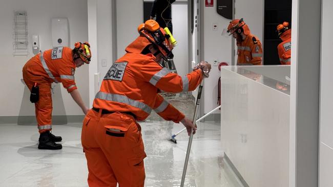 SES members mop up after the flood. Picture: X