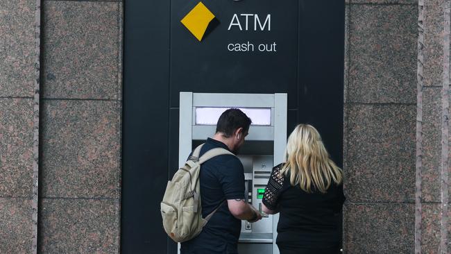 SYDNEY, AUSTRALIA -Newswire Photos JANUARY 24, 2022: A general view of people at the Comm Bank ATM on George Street in Sydney CBD as the cost of living continues to rise. Picture NCA Newswire/ Gaye Gerard