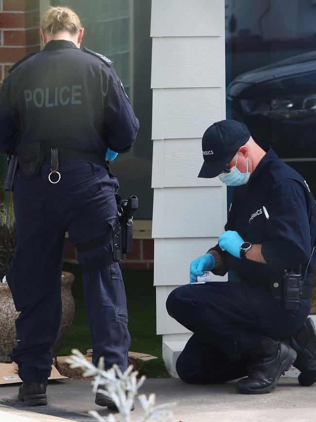 orensic Police are seen collecting evidence at Christ The Good Shepherd Church in the suburb of Wakeley. Picture: Getty Images