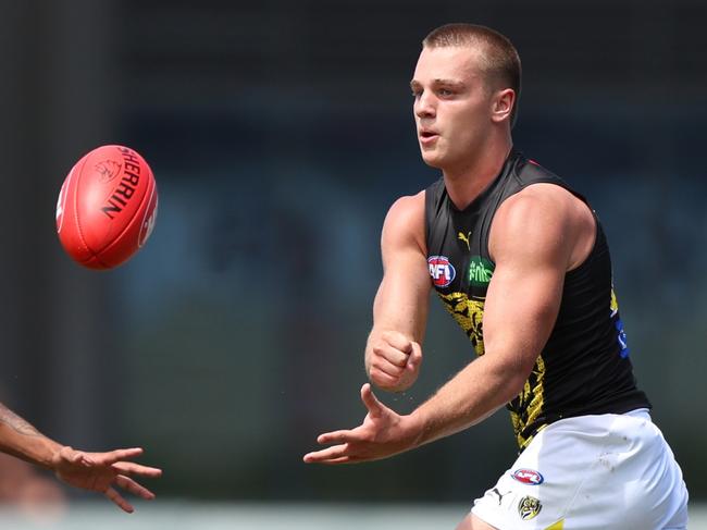 Top draftee Sam Lalor handballs against West Coast. Picture: Janelle St Pierre/Getty Images