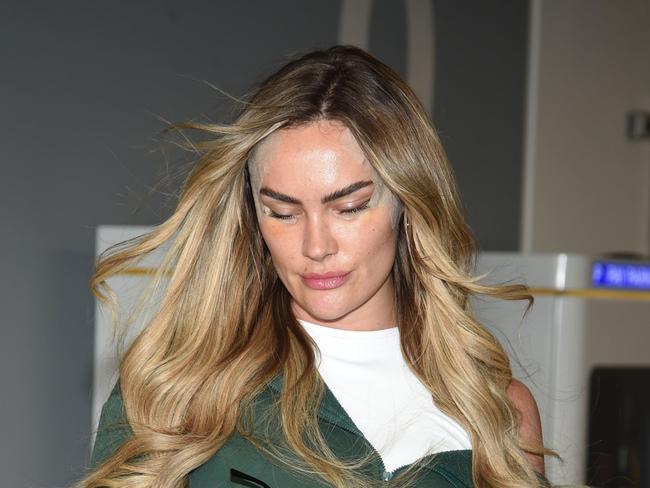 Amy Kenyon seen arriving into Manchester Airport after cateye surgery. Picture: AARON PARFITT / BACKGRID
