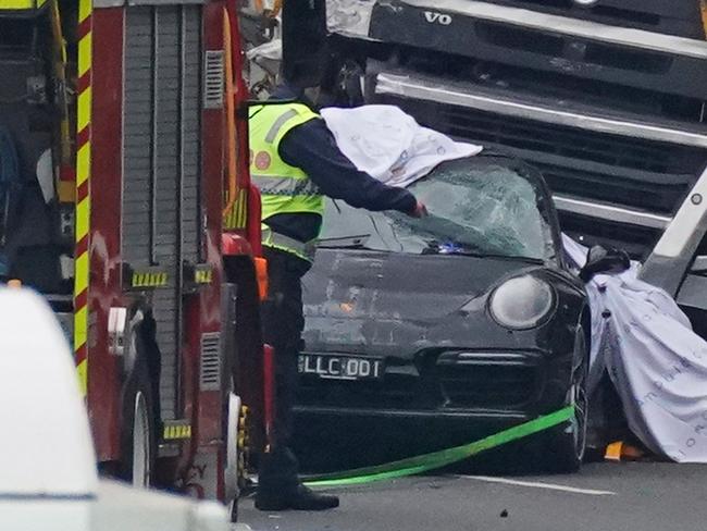 Mohinder Singh’s truck and Richard Pusey’s car on the Eastern Freeway where four police officers were killed in April last year. Picture: Scott Barbour/AAP