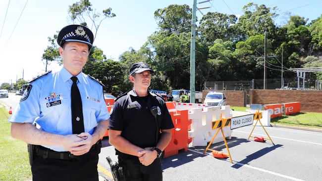 Gold Coast Police District Chief Superintendent Mark Wheeler and Senior Sergeant Bradyn Murphy inspect barriers at Miles Street in Kirra. Photo: Scott Powick.