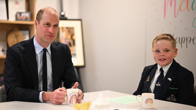 BIRMINGHAM, ENGLAND - APRIL 25: Britain's Prince William, Prince of Wales speaks with students about the mental health initiatives that take place there, during a visit to St. Michael's Church of England High School in Rowley Regis, on April 25, 2024. During his visit Prince William, Prince of Wales will learn about the award-winning student-led initiatives available to pupils to support their mental health and wellbeing. (Photo by Oli Scarff - WPA Pool/Getty Images)