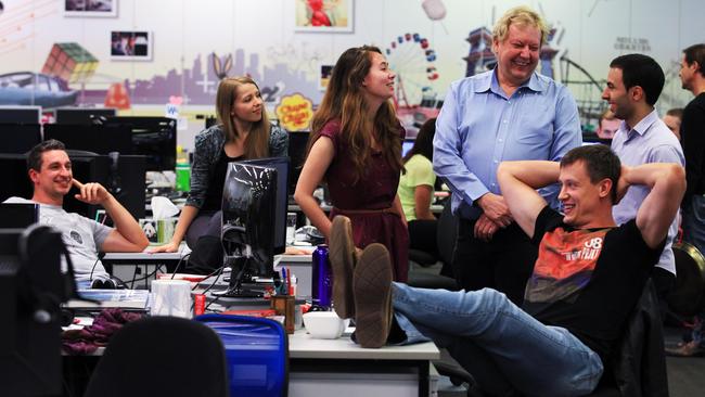 Richard White (blue shirt) with WiseTech Global employees at its Sydney headquarters in 2012. Picture: Sam Mooy