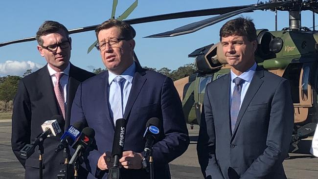 NSW Treasurer Dominic Perrottet, NSW Emergency Services Minister Troy Grant and Federal Law Enforcement and Cyber Security Minister Angus Taylor at Holsworthy Army Barracks.