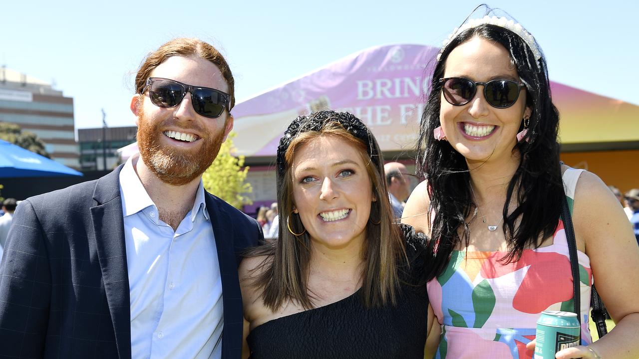 Caulfield Guineas horse race meeting, Caulfield, Victoria, Saturday 12th October 2024. Faces in the crowd. Pictured enjoying the race meeting are Joey, Lauren and Bella. Picture: Andrew Batsch