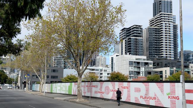 Boards cover more vacant land on the corner of King Street and Rosslyn Street, West Melbourne. Picture: Andrew Henshaw