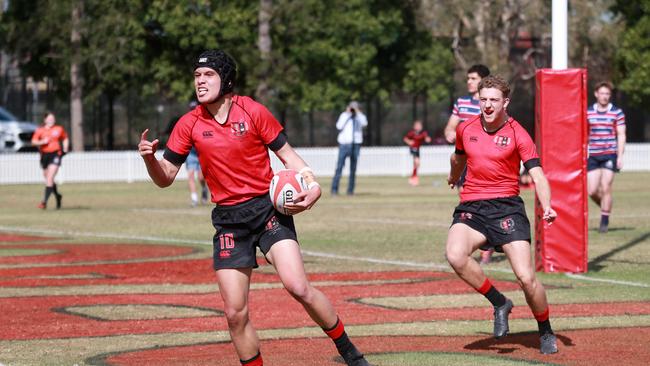 GT flyhalf Quinn Siolo scores a try against The Southport School. Picture: AAP/Image Sarah Marshall)