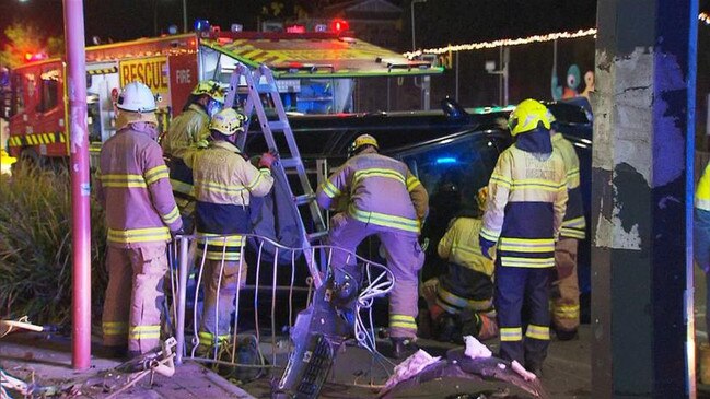 Rescue crews were eventually able to extract her from the car. Picture: 7 NEWS