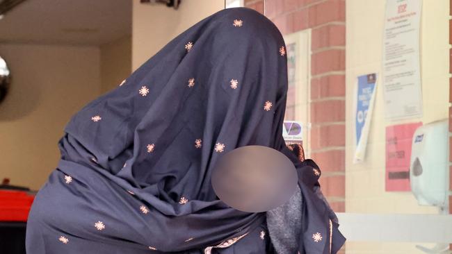 A 14-year-old girl leaves the Adelaide youth court on April 12 after facing court on charges of possessing explosive instructions and extremist material Picture: NCA NewsWire / Kelly Barnes