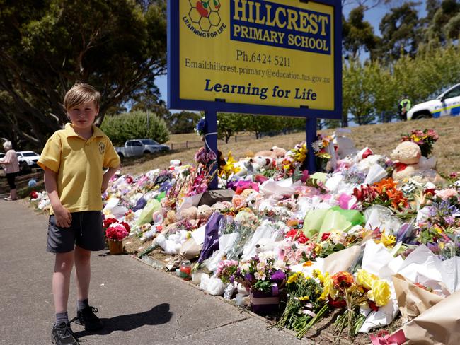 Zavier Furley pays tribute to his lost schoolmates outside Hillcrest Primary School. Picture: NCA NewsWire / Grant Viney