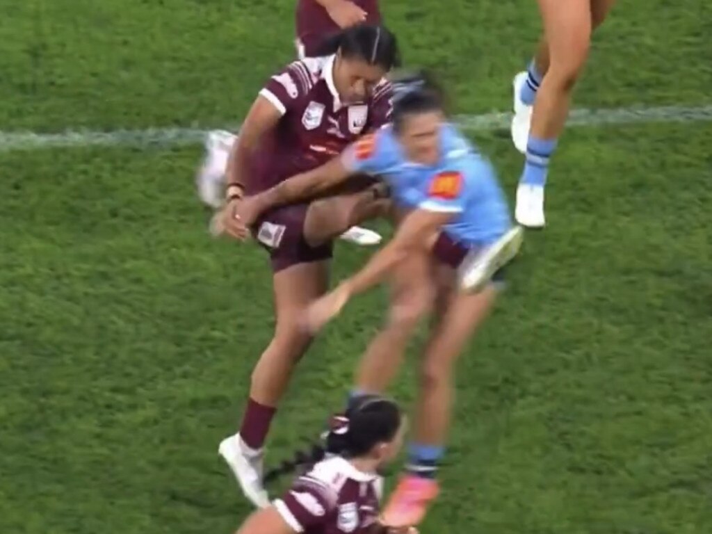 Corban Baxter attacks the kicking leg of Zahara Temara. Picture: Channel Nine