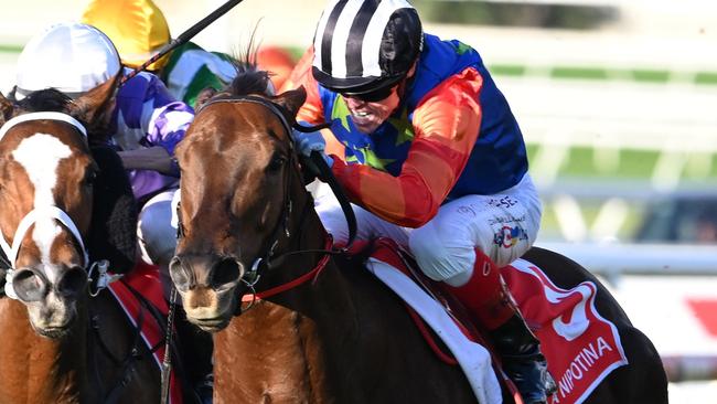 Bella Nipotina mows down I Wish I Win to win the Group 1 Doomben 10,000 for jockey Craig Williams. Picture. Grant Peters - Trackside Photography