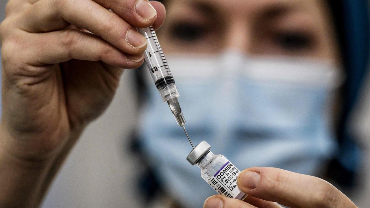 A medical staff member prepares a syringe with a dose of the Pfizer vaccine. Picture: Jeff Pachoud / AFP