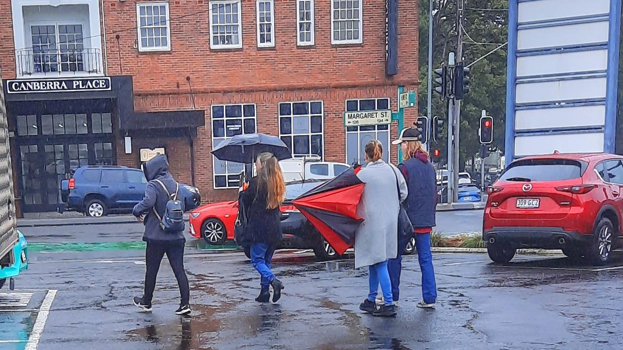 Kathleen Collingsworth (left with umbrella) and Rachel Baldwin (left with umbrella) gave evidence at the Toowoomba Magistrates Court on July 04, 2023. Picture: News Regional Media