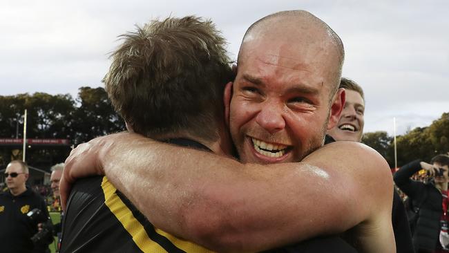 SANFL - GRAND FINAL  22/09/19 - Port Adelaide v Glenelg at Adelaide Oval. Aaron Joseph hugs coach Mark Stone after the win Picture SARAH REED