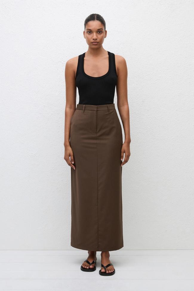 MatteauRelaxed Tailored SkirtEvery office-goer needs a casual yet classy tailored skirt during the summer. We’d recommend this maxi from Matteau, which we love for its relaxed fit, trendy chocolate brown hue, and lightweight approach to everyday suiting.Type: Skirt | Material: Virgin wool, econylon, elastane, cupro | Colour: Brown, black | Delivery: Free over $290Shop now for $432 (was $480)