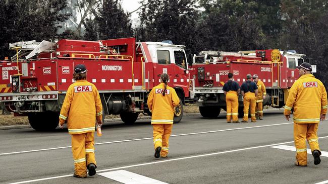 Firefighters prepare to roll out on January 6 in Cann River. Picture: Getty Images