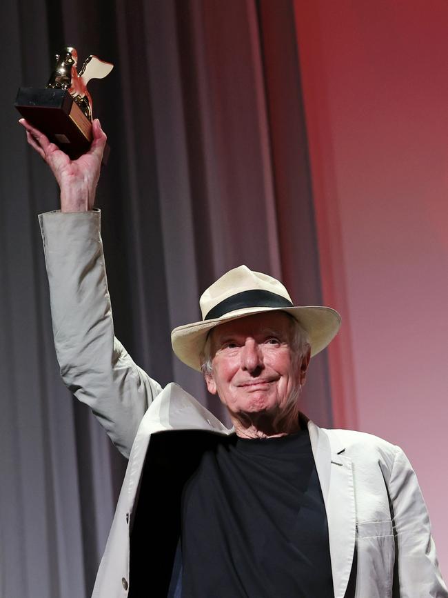 Weir with his award. Picture: Getty Images