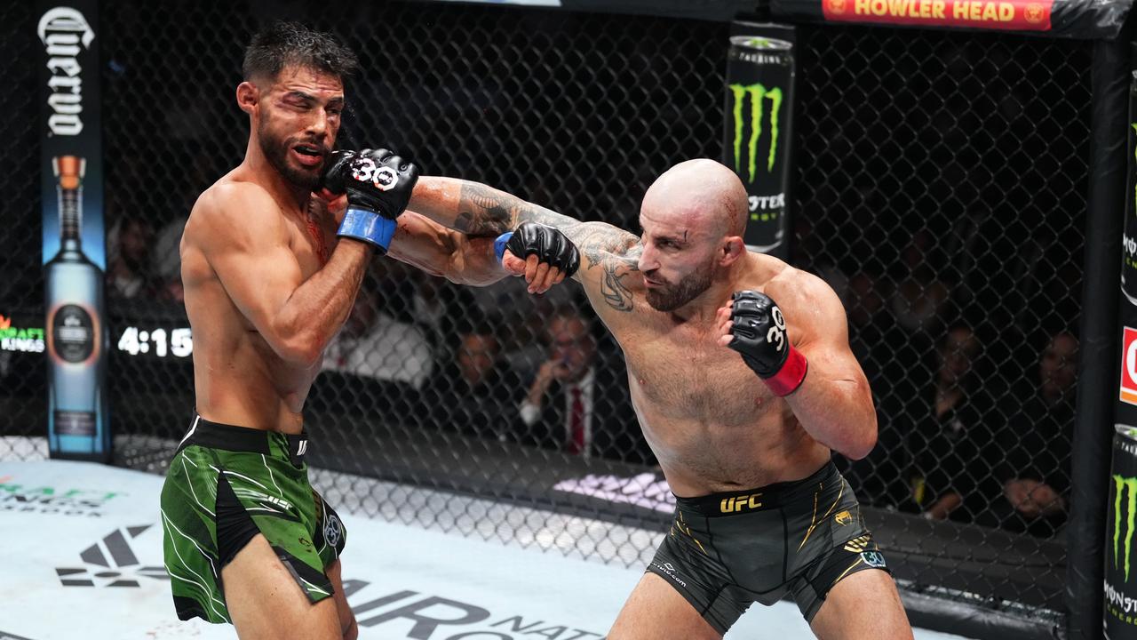 Alexander Volkanovski of Australia punches Yair Rodriguez of Mexico in the UFC featherweight championship fight during the UFC 290 event at T-Mobile Arena on July 08, 2023 in Las Vegas, Nevada. (Photo by Jeff Bottari/Zuffa LLC via Getty Images)