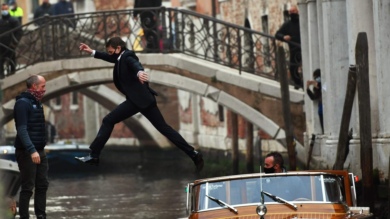 Cruise performing his own stunts. Picture: Marco Sabadin/AFP