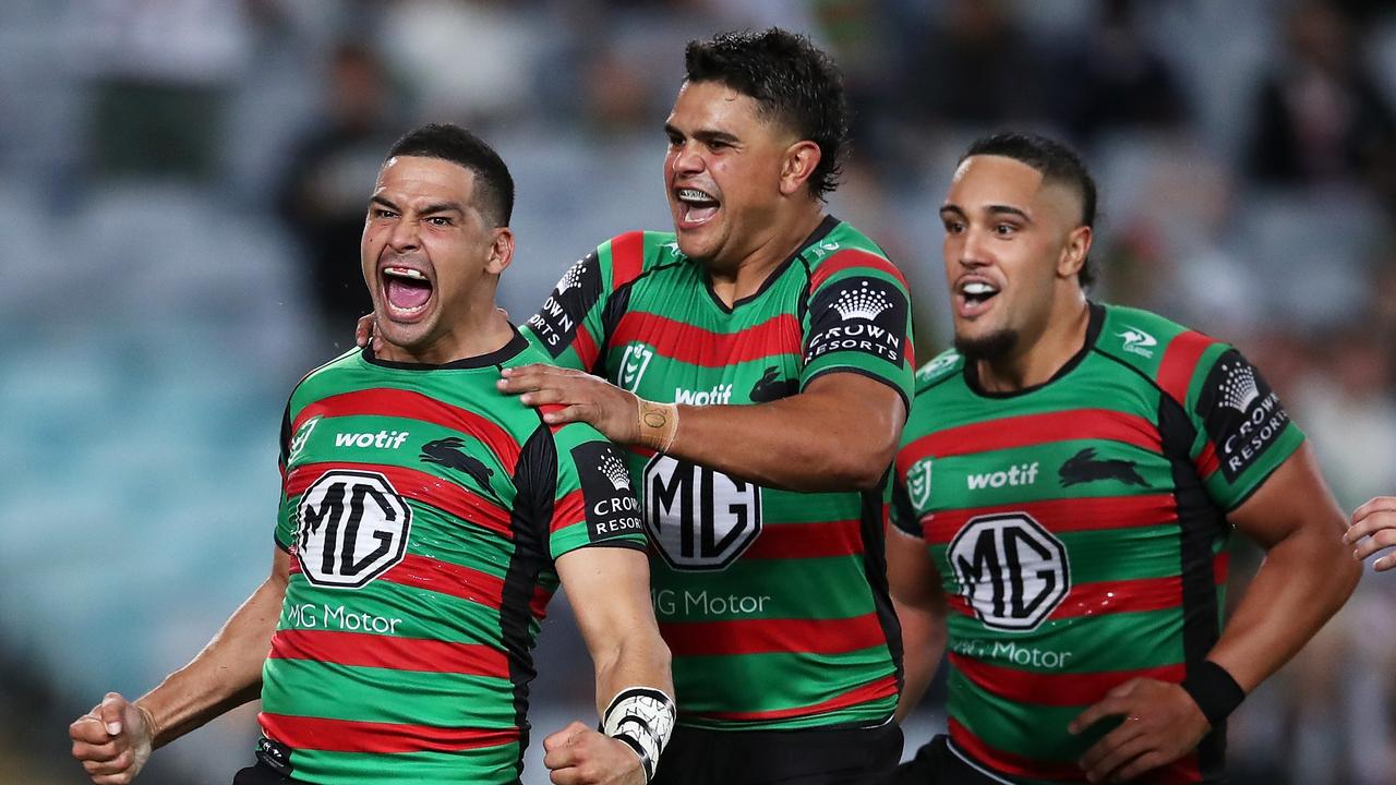 Cody Walker (L) and Latrell Mitchell (C) have both signed new deals to keep them at South Sydney. Picture: Getty