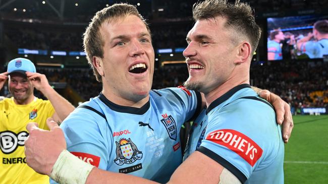 BRISBANE, AUSTRALIA - JULY 17: Jake Trbojevic and Angus Crichton of the Blues celebrate victory following game three of the 2024 Men's State of Origin series between Queensland Maroons and New South Wales Blues at Suncorp Stadium on July 17, 2024 in Brisbane, Australia. (Photo by Bradley Kanaris/Getty Images)