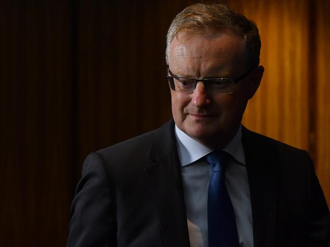 Governor of the Reserve Bank of Australia (RBA) Phillip Lowe arrives to speak to the media during a press conference in Sydney, Tuesday, April 21, 2020. (AAP Image/Joel Carrett) NO ARCHIVING