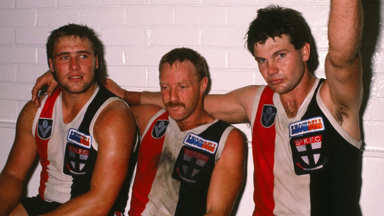 Danny Frawley celebrates a St Kilda in 1989 with Tony Lockett (left).