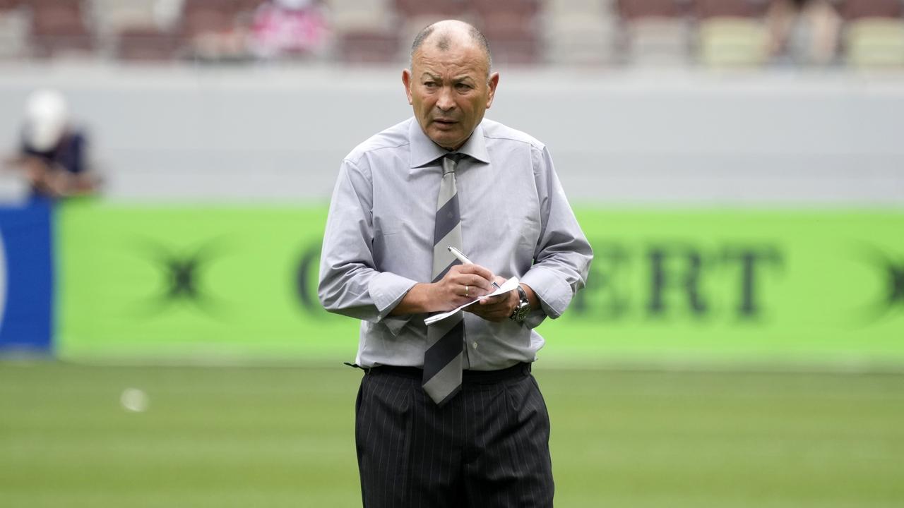 Japan coach Eddie Jones warming up before the game.  (Photo courtesy of Toru Hanai/Getty Images)