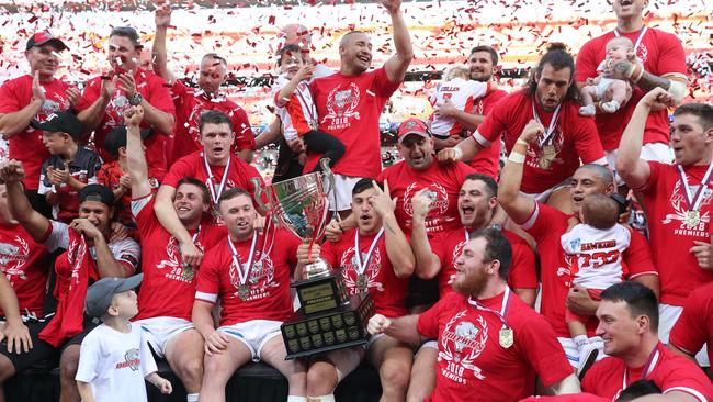 The Dolphins celebrate their 2018 Intrust Cup Grand Final triumph. Photo: Peter Wallis