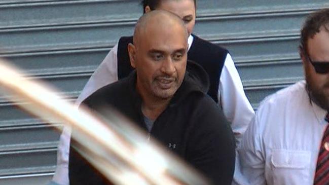 Tereapii Pokoina being led into court after being arrested over the $20m cocaine haul. Picture: Nine News