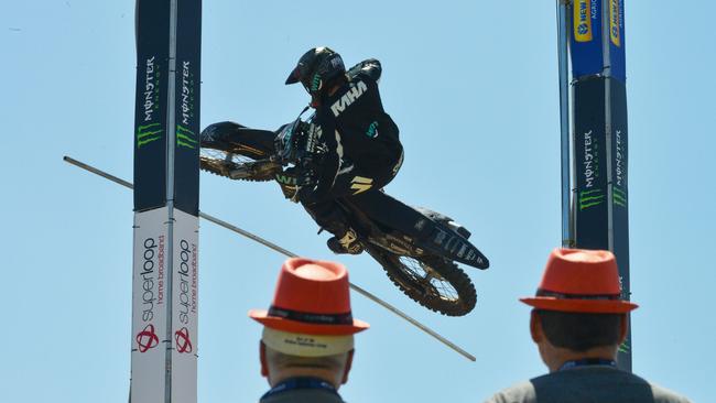 A competitor tries to ride over the bar in the Moto X Step-Up at the Superloop Adelaide 500 in 2019. Picture: AAP/Brenton Edwards