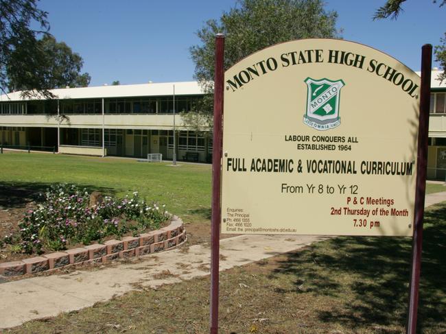 02 Oct 2004 Monto State High School sign. Students were paid by the State Govt. contractor to remove deadly asbestos materials from the school's science lab during refurbishment in Sept 2002. PicDerek/Moore education qld buildings exterior signs pollution health hazards