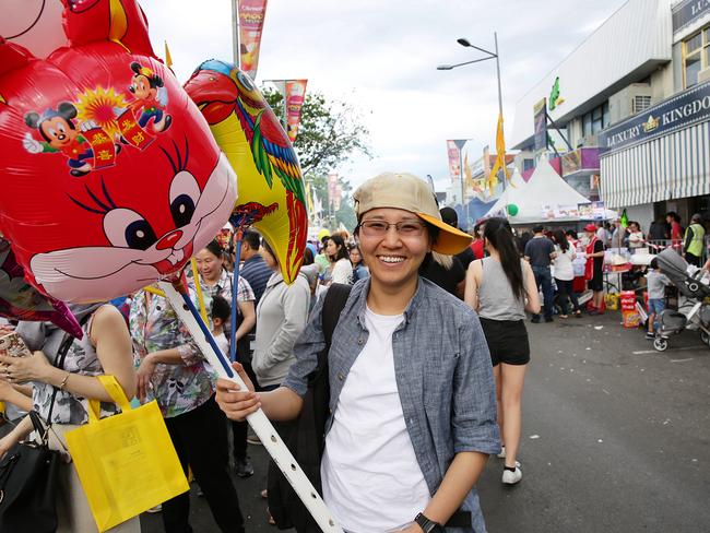 Oscar Do poses for a photo selling balloons in 2017. Picture: Carmela Roche.