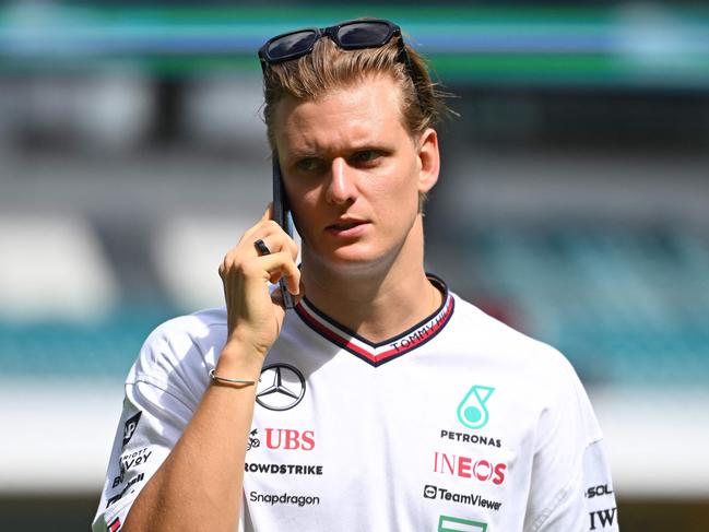 MIAMI, FLORIDA - MAY 05: Mick Schumacher of Germany, Reserve Driver of Mercedes talks on the phone as he walks in the Paddock prior to the F1 Grand Prix of Miami at Miami International Autodrome on May 05, 2024 in Miami, Florida.   Rudy Carezzevoli/Getty Images/AFP (Photo by Rudy Carezzevoli / GETTY IMAGES NORTH AMERICA / Getty Images via AFP)