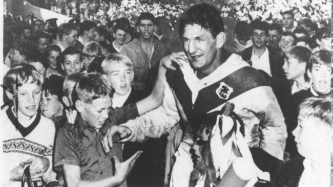 Norm Provan, a second row forward who played for the St George Dragons rugby league club. He also represented both NSW and Australia. Pictured with others including family.