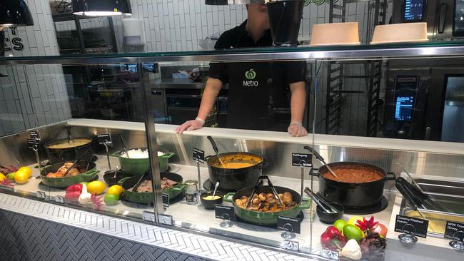 The store is the first Woolworths to have a full hot food to go offer including sushi, poke bowls, pizza, salads, curries, coffee and even hot roast dinners. Picture: Benedict Brook