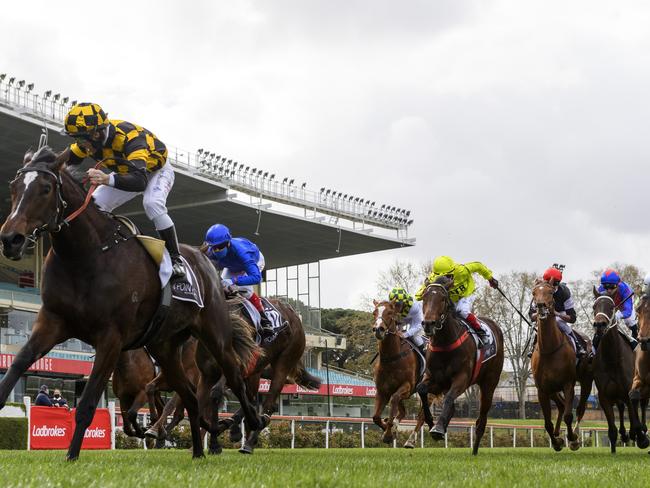 MELBOURNE, AUSTRALIA - SEPTEMBER 04: Brett Prebble riding Zouzarella winning race 6, the 3 Point Motors Atlantic Jewel Stakes,  during Melbourne Racing at Moonee Valley Racecourse on September 04, 2021 in Melbourne, Australia. (Photo by Vince Caligiuri/Getty Images)