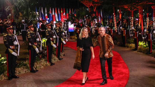 The PM arriving with partner Jodie Haydon for the summit’s gala dinner on Wednesday. Picture: AFP