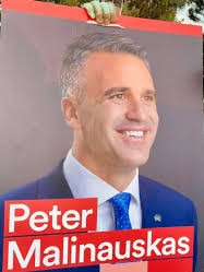 Staring off into the distance ... Labor leader Peter Malinauskas’ campaign poster.