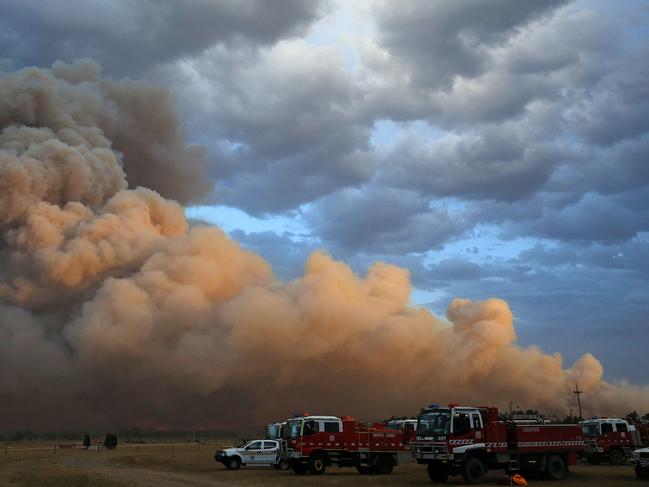 Firefighters are battling blaze in heavy winds on Friday. Picture: Mark Stewart