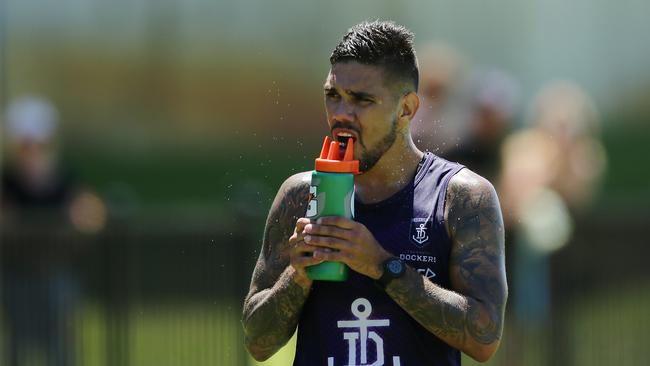 PERTH, AUSTRALIA - JANUARY 13: Michael Walters of the Dockers hydrates during a Fremantle Dockers AFL training session at Victor George Kallis Oval on January 13, 2020 in Perth, Australia. (Photo by Will Russell/Getty Images)