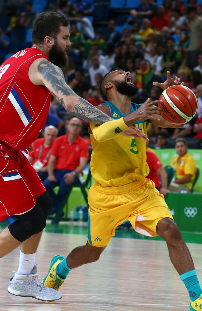 Miroslav Raduljica fouls Patty Mills.