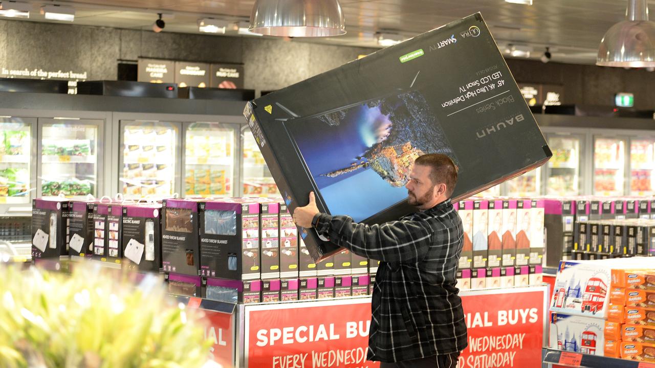 A customer gets ready to purchase one of the hottest Aldi Special Buys in Perth.