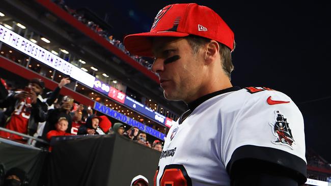 Tom Brady leaves the field after the Tampa Bay Buccaneers were defeated by the Los Angeles Rams 30-27 in the NFC Divisional Playoff game. Picture: Mike Ehrmann/Getty Images