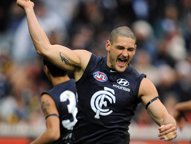 Playing for Carlton at the MCG.