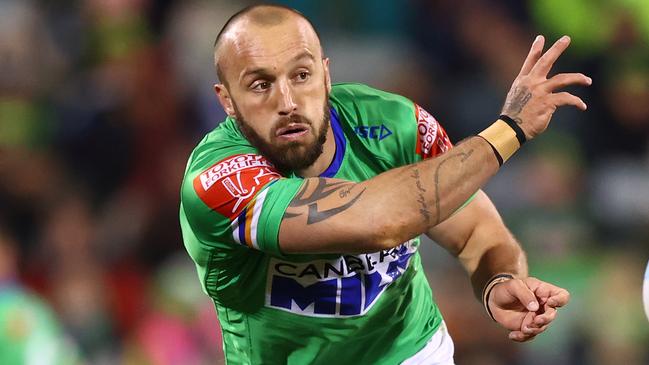 CANBERRA, AUSTRALIA - JUNE 12: Josh Hodgson of the Raiders passes during the round 14 NRL match between the Canberra Raiders and the Brisbane Broncos at GIO Stadium, on June 12, 2021, in Canberra, Australia. (Photo by Mark Nolan/Getty Images)